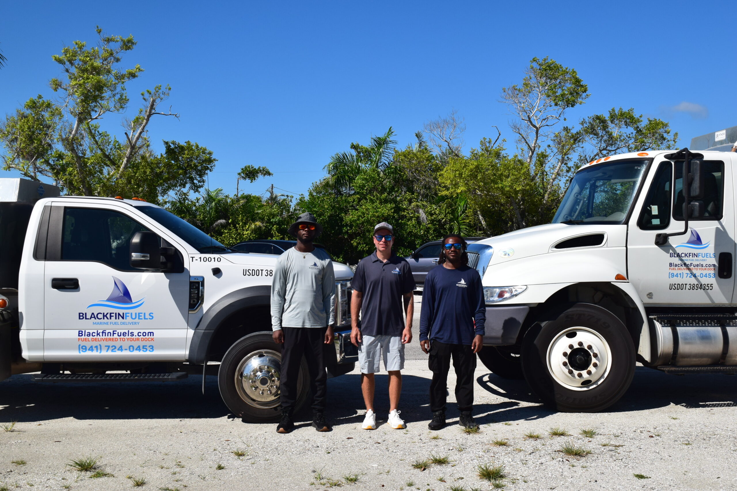Blackfin Fuels team with delivery trucks
